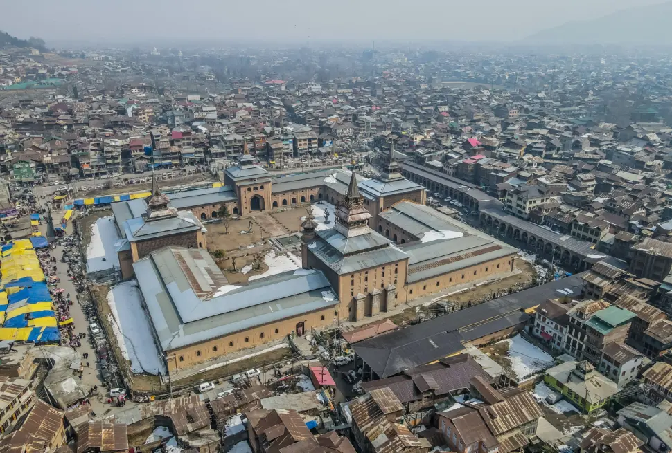 Drone shot of Jamia Masjid in Srinagar showcasing its architectural design amidst the cityscape.